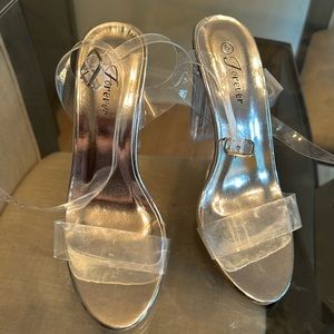 Clear pair of heels in size 6